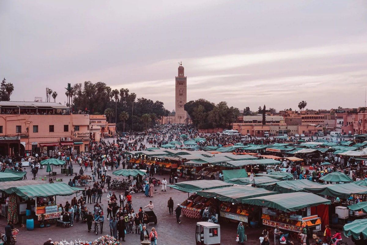 Jemaa el-Fnaa and Marrakech Medina at sunset with Koutoubia Mosque